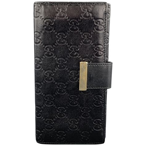 gucci black embossed wallet|vintage Gucci wallet black leather.